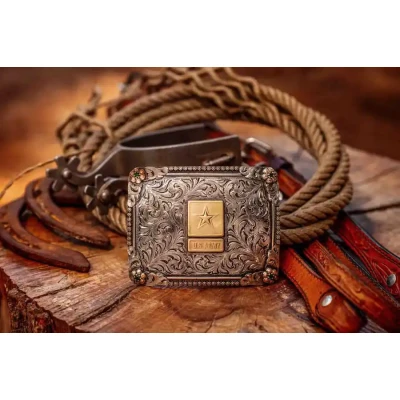 A Military Belt Buckle with the US Army emblem in a western background